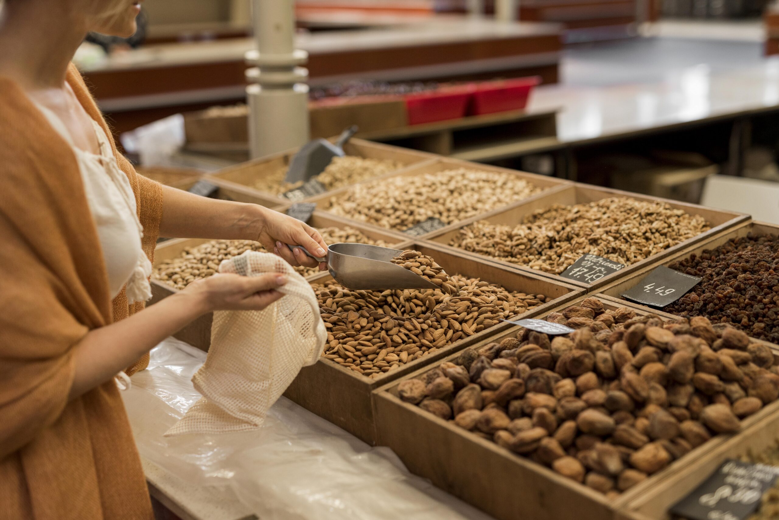 woman-taking-dried-food-market-place-scaled.jpg